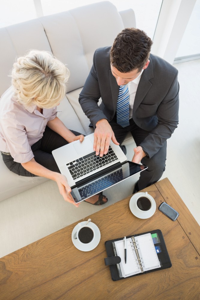 Meeting between 2 people; an accountant and a client